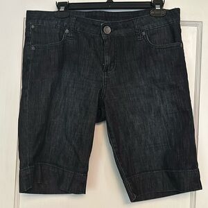 Deep blue jean shorts.